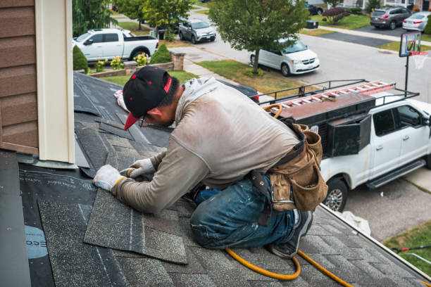Professional Roofing technician working in Acton, ME